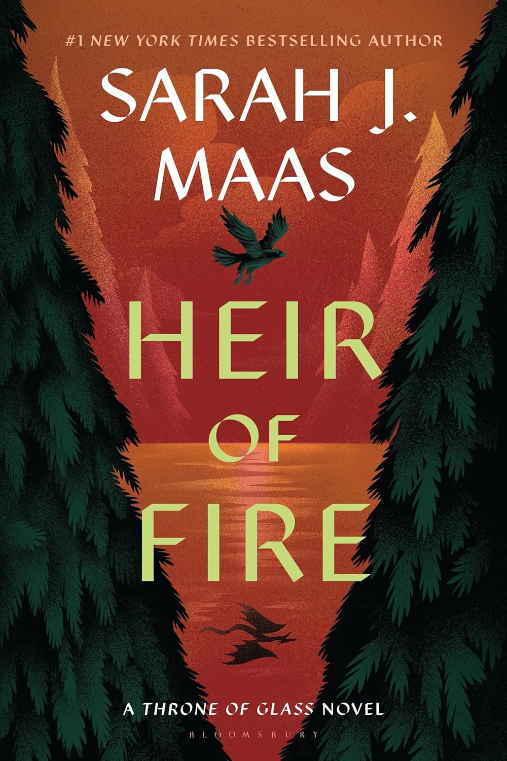 Book cover of 'Heir of Fire' by Sarah J. Maas with a red sky and trees.