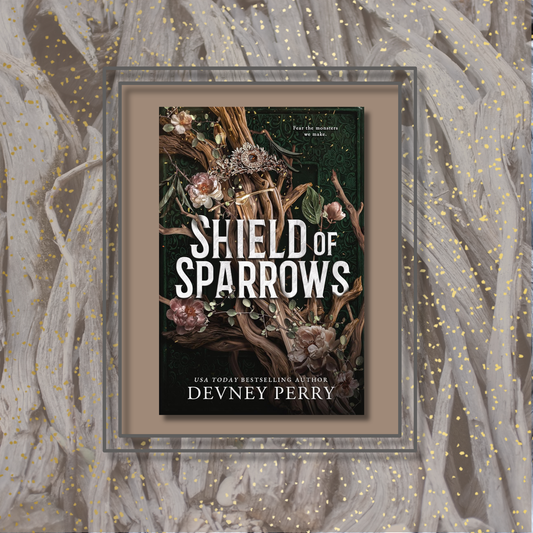 shield_of_sparrows_by_devney_perry book cover on a driftwood background